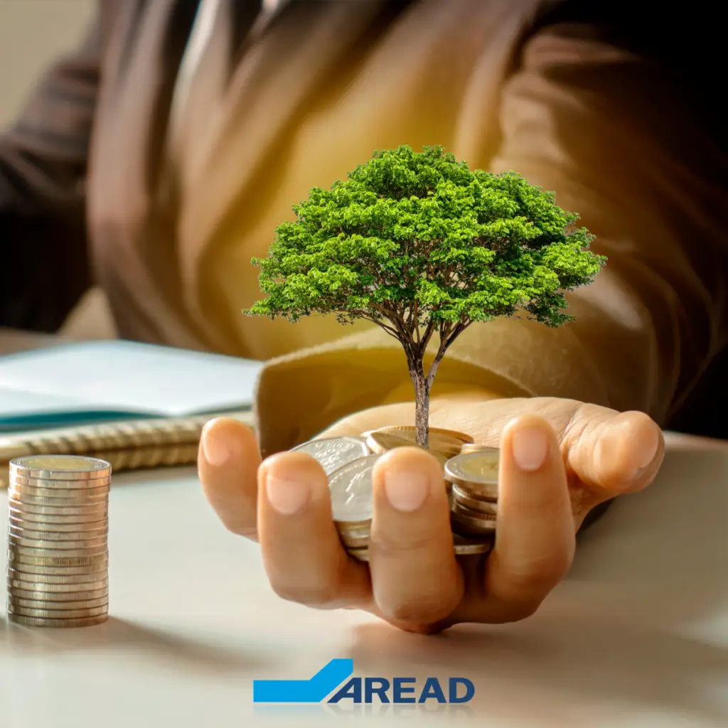 Image d'un homme au travail montrant sa pomme où pousse un arbre dont la racine est représentée par des pièces de monnaie. À côté, d'autres pièces de monnaie. Cette image représente les aides régionales en Île-de-France, notamment les dispositifs Innov'up, PM'up et TP'up.